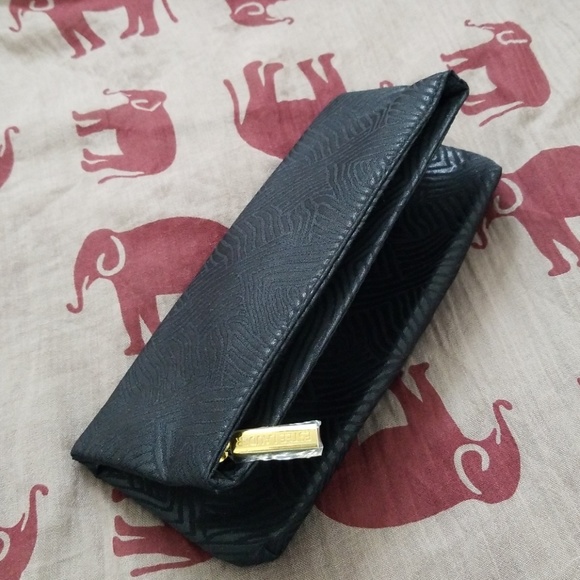 Estee Lauder Handbags - Estee Lauder fold over clutch or cosmetic bag